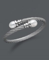 Wrap your wrists in polished perfection. This coil-shaped bangle bracelet features white cultured freshwater pearls (10-11 mm) set in stainless steel. Approximate length: 8 inches. Wrap your wrists in polished perfection. This coil-shaped bangle bracelet features white cultured freshwater pearls (10-11 mm) set in stainless steel. Approximate length: 8 inches.