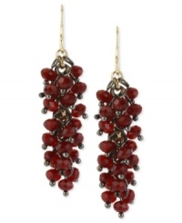 Beads band together to stunning effect in this pair of earrings from Kenneth Cole New York. Crafted from gold-tone mixed metal, the earrings are adorned with a number of red faceted accents. Approximate drop: 1-9/10 inches. Beads band together to stunning effect in this pair of earrings from Kenneth Cole New York. Crafted from gold-tone mixed metal, the earrings are adorned with a number of red faceted accents. Approximate drop: 1-9/10 inches.