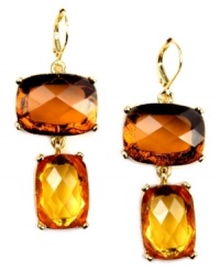 Drops of jupiter. These soothing earrings by AK Anne Klein feature a double pendant design in rectangular, topaz-color glass beads. Crafted in gold tone mixed metal. Approximate drop: 2 inches. Drops of jupiter. These soothing earrings by AK Anne Klein feature a double pendant design in rectangular, topaz-color glass beads. Crafted in gold tone mixed metal. Approximate drop: 2 inches.