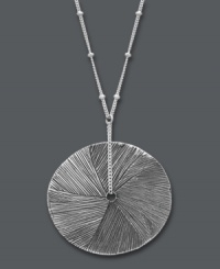 Reinvent the wheel. Studio Silver's large circular pendant revamps a classic design with a textured surface and delicate beaded chain. Crafted in sterling silver. Approximate length: 18 inches. Approximate drop: 1-1/2 inches. Reinvent the wheel. Studio Silver's large circular pendant revamps a classic design with a textured surface and delicate beaded chain. Crafted in sterling silver. Approximate length: 18 inches. Approximate drop: 1-1/2 inches.