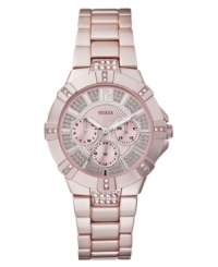 Ladylike with pink tones and glistening crystals, this GUESS watch is a chic delight. Ladylike with pink tones and glistening crystals, this GUESS watch is a chic delight.