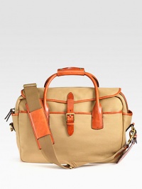 Drawing rustic inspiration from days spent in the great outdoors, a handsome bag is rendered in durable canvas with antiqued brass accents and burnished leather trim for an authentic, timeworn look.Zip closureDouble top handlesAdjustable, removable shoulder strapExterior slip pocketsInterior slip, zip pocketsEmbossed signature leather luggage tag Accented with antiqued brass hardware and burnished leather trimCanvas16W x 11H x 5DImported Drawing rustic inspiration from days spent in the great outdoors, a handsome bag is rendered in durable canvas with antiqued brass accents and burnished leather trim for an authentic, timeworn look.Zip closureDouble top handlesAdjustable, removable shoulder strapExterior slip pocketsInterior slip, zip pocketsEmbossed signature leather luggage tag Accented with antiqued brass hardware and burnished leather trimCanvas16W x 11H x 5DImported