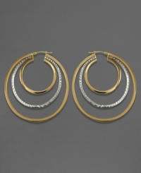 Add sparkling dimension to your ears with these chic triple-hoop earrings. In 14k gold and sterling silver; measures approximately 2 inches in diameter. Add sparkling dimension to your ears with these chic triple-hoop earrings. In 14k gold and sterling silver; measures approximately 2 inches in diameter.