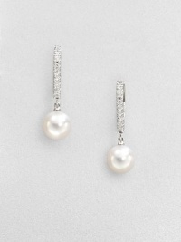 A column of dazzling diamonds set in 18k white gold accent this elegant Akoya pearl drop design. 7.5mm round white Akoya pearlsDiamonds, .08 tcw18k white goldDrop, about 1Lever backImported 