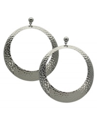 GUESS takes the traditional hoop earring and adds an on-trend twist with a unique textured design. Set in imitation rhodium-plated mixed metal. Approximate drop: 3-1/2 inches. Approximate diameter: 2-1/4 inches. GUESS takes the traditional hoop earring and adds an on-trend twist with a unique textured design. Set in imitation rhodium-plated mixed metal. Approximate drop: 3-1/2 inches. Approximate diameter: 2-1/4 inches.
