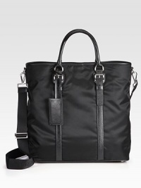 An everyday essential, handsomely crafted in tessuto nylon, trimmed with textured saffiano leather.Snap button closureDouble top handlesAdjustable shoulder strapInterior zip pocketNylon15W x 15H x 7DMade in Italy An everyday essential, handsomely crafted in tessuto nylon, trimmed with textured saffiano leather.Snap button closureDouble top handlesAdjustable shoulder strapInterior zip pocketNylon15W x 15H x 7DMade in Italy