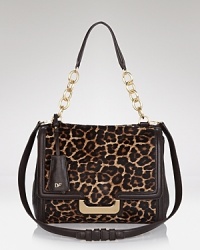 Leopard print haircalf lends a luxurious sheen to DIANE von FURSTENBERG's structured shoulder bag. Leopard print haircalf lends a luxurious sheen to DIANE von FURSTENBERG's structured shoulder bag.