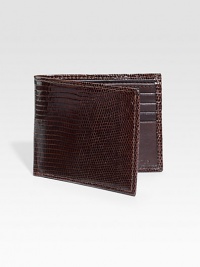 EXCURSIVELY OURS.An elegant menswear standard is crafted in genuine lizard. One bill compartmentEight card slots4½ X 3½Imported