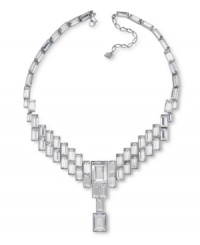 Exquisite and extraordinary. Make a showstopping statement at your next special occasion with Swarovski's clear crystal baguette necklace. Art Deco-inspired and dazzling by design, it's crafted in silver tone mixed metal. Approximate length: 13-3/4 inches + 2-inch extender. Approximate drop: 2-1/2 inches. Exquisite and extraordinary. Make a showstopping statement at your next special occasion with Swarovski's clear crystal baguette necklace. Art Deco-inspired and dazzling by design, it's crafted in silver tone mixed metal. Approximate length: 13-3/4 inches + 2-inch extender. Approximate drop: 2-1/2 inches.