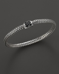 Extra small sterling woven chain bracelet with carved chain black sapphire clasp, designed by John Hardy. Extra small sterling woven chain bracelet with carved chain black sapphire clasp, designed by John Hardy.