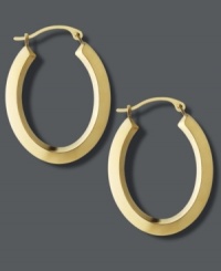 Frame your face with the perfect accent piece. Traditional hoop earrings receive a modern update with a chic, oval shape in polished 18k gold. Approximate drop length: 1 inch. Approximate drop width: 3/4 inch. Frame your face with the perfect accent piece. Traditional hoop earrings receive a modern update with a chic, oval shape in polished 18k gold. Approximate drop length: 1 inch. Approximate drop width: 3/4 inch.