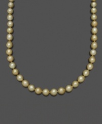 Like drops of gold washed onto the beach, this extraordinary pearl necklace features oval-shaped south sea pearls (10-12 mm) set in 14k gold. Approximate length: 18 inches. Like drops of gold washed onto the beach, this extraordinary pearl necklace features oval-shaped south sea pearls (10-12 mm) set in 14k gold. Approximate length: 18 inches.