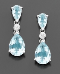 Dazzling pear-cut aquamarines (1-1/2 ct. t.w.) and sparkling diamond accents combine for a luxurious look. Set in 14k white gold. Dazzling pear-cut aquamarines (1-1/2 ct. t.w.) and sparkling diamond accents combine for a luxurious look. Set in 14k white gold.