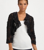 EXCLUSIVELY AT SAKS. A classic bolero silhouette, dressed up with ribbon trim in a stunning lace design.Lace collarThree-quarter sleevesOpen frontPolyesterAbout 18 center backDry cleanMade in the USA of imported fabric