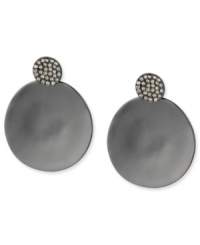 A stylish look takes shape in this pair of drop earrings from Kenneth Cole New York. Crafted from silver-tone mixed metal, the concave disc earrings sparkle with glass pave crystal accents. Approximate drop: 2 inches. A stylish look takes shape in this pair of drop earrings from Kenneth Cole New York. Crafted from silver-tone mixed metal, the concave disc earrings sparkle with glass pave crystal accents. Approximate drop: 2 inches.