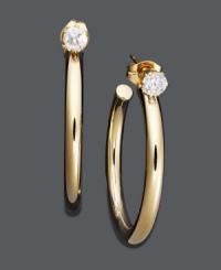 Simple hoops with an extra pop of sparkle. Crafted in 14k gold, these tube-style hoops feature a round-cut cubic zirconia at the post (1/2 ct. t.w.). Approximate diameter: 1 inch. Simple hoops with an extra pop of sparkle. Crafted in 14k gold, these tube-style hoops feature a round-cut cubic zirconia at the post (1/2 ct. t.w.). Approximate diameter: 1 inch.