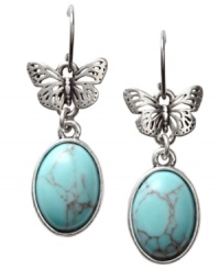 Organically appealing. Fossil's pretty earring design takes its cue from nature with oval-cut reconstituted turquoise stones and petite cut-out butterflies. Crafted in vintage silver tone mixed metal on fish wire. Approximate drop: 1-1/2 inches. Organically appealing. Fossil's pretty earring design takes its cue from nature with oval-cut reconstituted turquoise stones and petite cut-out butterflies. Crafted in vintage silver tone mixed metal on fish wire. Approximate drop: 1-1/2 inches.