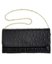 Tap into this season's exotic trend with DKNY's ostrich-embossed leather clutch that lends a look of uptown elegance. The versatile design goes from a shoulder bag to a clutch in an instant, while plenty of pockets and compartments offer superb organization within. Tap into this season's exotic trend with DKNY's ostrich-embossed leather clutch that lends a look of uptown elegance. The versatile design goes from a shoulder bag to a clutch in an instant, while plenty of pockets and compartments offer superb organization within.