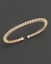 Dazzling diamonds, set in 14K yellow gold, make the perfect bracelet for stacking.