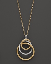 A mix of rings forms a modern pendant on this 18K gold necklace from Marco Bicego. A mix of rings forms a modern pendant on this 18K gold necklace from Marco Bicego.
