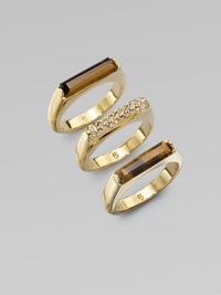 Three exquisite rings with either rich, tiger's eye bars or dazzling rhinestones, perfect for stacking. Tiger's eyeGlass stonesGoldtone brassWidth, about ¾Imported