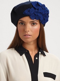 A retro-inspired, wool-blend knit topper with a pleated floral design.Pull-on style with concealed elastic bandWoolDry clean onlyImported A retro-inspired, wool-blend knit topper with a pleated floral design.Pull-on style with concealed elastic bandWoolDry clean onlyImported