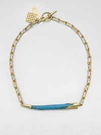 From the Horn Collection. A tapered horn-shaped pendant with the rich veining of turquoise suspends horizontally from an open golden chain for an intriguing look.Natural stone18k goldplatedChain length, about 18Pendant width, about 2.5Toggle closureMade in USA From the Horn Collection. A tapered horn-shaped pendant with the rich veining of turquoise suspends horizontally from an open golden chain for an intriguing look.Natural stone18k goldplatedChain length, about 18Pendant width, about 2.5Toggle closureMade in USA