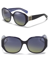 Create daytime drama in deep blue Tory Burch shades. Create daytime drama in deep blue Tory Burch shades.