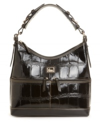 Two handy front pockets add zip to the glossy croc-embossed patent leather sac purse by Dooney & Bourke. Two handy front pockets add zip to the glossy croc-embossed patent leather sac purse by Dooney & Bourke.