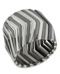 Kenneth Cole New York sets the tone-twice over-in this stretch bracelet. It's crafted from silver- and hematite-tone mixed metal, forming a pattern that's sure to please. Approximate length: 7-1/2 inches. Kenneth Cole New York sets the tone-twice over-in this stretch bracelet. It's crafted from silver- and hematite-tone mixed metal, forming a pattern that's sure to please. Approximate length: 7-1/2 inches.