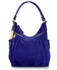 Laid-back with a little luxe, this lovely leather hobo by Tignanello is adorned with golden hardware and delicate detail stitching. Plenty of pockets inside and out add practicality, for a style that'll take you from deskside to after dinner drinks. Laid-back with a little luxe, this lovely leather hobo by Tignanello is adorned with golden hardware and delicate detail stitching. Plenty of pockets inside and out add practicality, for a style that'll take you from deskside to after dinner drinks.
