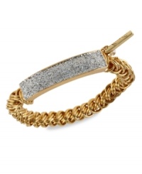 Make a name for yourself with this half-stretch ID bracelet from Kenneth Cole New York. Crafted from gold-tone mixed metal, the ID plate features silver-colored glitter accents for a lustrous effect. Item comes packaged in a signature Kenneth Cole New York Gift Box. Approximate diameter: 2-1/2 inches. Make a name for yourself with this half-stretch ID bracelet from Kenneth Cole New York. Crafted from gold-tone mixed metal, the ID plate features silver-colored glitter accents for a lustrous effect. Item comes packaged in a signature Kenneth Cole New York Gift Box. Approximate diameter: 2-1/2 inches.