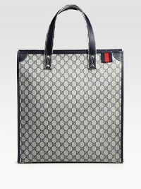 A signature design in GG-coated fabric with leather trim.Double handlesSignature web loopZip top closureDark palladium hardware16W x 16½H x 5D Made in Italy A signature design in GG-coated fabric with leather trim.Double handlesSignature web loopZip top closureDark palladium hardware16W x 16½H x 5D Made in Italy
