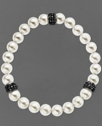 Slip a little elegance over your wrist. Kaleidoscope's pretty bracelet features a mix of cultured freshwater pearls (8 mm) and sparkling stations made from black crystals with Swarovski Elements. Bracelet stretches to fit wrist. Approximate length: 7-1/2 inches. Slip a little elegance over your wrist. Kaleidoscope's pretty bracelet features a mix of cultured freshwater pearls (8 mm) and sparkling stations made from black crystals with Swarovski Elements. Bracelet stretches to fit wrist. Approximate length: 7-1/2 inches.