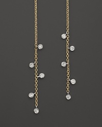 Faceted diamonds punctuate slim 14K yellow gold drops. By Meira T. Faceted diamonds punctuate slim 14K yellow gold drops. By Meira T.