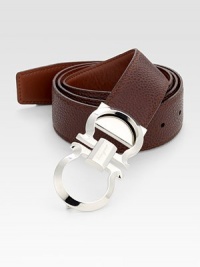 Smooth on one side and pebbled on the other, this reversible belt crafted in smooth Italian leather with double gancini buckle, will be a stylish, versatile addition to your existing wardrobe.LeatherAbout 2 wideMade in Italy Smooth on one side and pebbled on the other, this reversible belt crafted in smooth Italian leather with double gancini buckle, will be a stylish, versatile addition to your existing wardrobe.LeatherAbout 2 wideMade in Italy