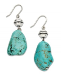 Reconstituted turquoise lends a soothing touch in these nugget-shaped earrings from Lauren by Ralph Lauren. Crafted in antiqued silver tone mixed metal. Approximate drop: 1-1/4 inches. Approximate diameter: 1/2 inch.