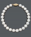 Excellence and luxury combine in this polished strand. Grade A+, cultured freshwater pearls (7-1/2-8 mm) shine against a 14k gold clasp. Approximate length: 8 inches.