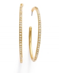 Get dramatic with large statement hoops. Lauren by Ralph Lauren presents hoop earrings with extra flair-coated with sparkling pave-set crystals. Crafted in gold tone mixed metal. Approximate diameter: 1-1/2 inches.