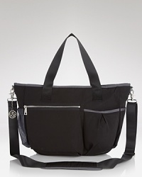 DKNY puts a sleek spin on the diaper bag with black nylon and an understated silhouette. Ideal for the city-chic stroller mom, this bag carries your babe's essentials with style. DKNY puts a sleek spin on the diaper bag with black nylon and an understated silhouette. Ideal for the city-chic stroller mom, this bag carries your babe's essentials with style.