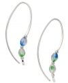 A sweep of color and a bit of polish. Jody Coyote's pretty loop earrings are crafted in sterling silver with silver and Czech glass accent beads in blue and green. Approximate drop: 1-1/2 inches.