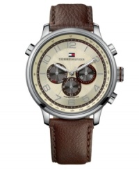 An new take on traditional, this watch by Tommy Hilfiger keeps things interesting with texture. Brown leather strap and round stainless steel case. Parchment chronograph dial with textured inner dial features silver tone numerals, three subdials, luminous hands and logo at twelve o'clock. Quartz movement. Water resistant to 50 meters. Ten-year limited warranty. An new take on traditional, this watch by Tommy Hilfiger keeps things interesting with texture. Brown leather strap and round stainless steel case. Parchment chronograph dial with textured inner dial features silver tone numerals, three subdials, luminous hands and logo at twelve o'clock. Quartz movement. Water resistant to 50 meters. Ten-year limited warranty.