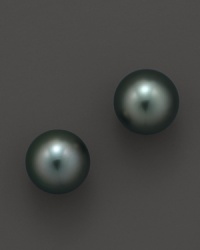 Naturally colored, cultured Tahitian black pearls make a statement on delicate stud earrings. From Tara Pearls. Naturally colored, cultured Tahitian black pearls make a statement on delicate stud earrings. From Tara Pearls.