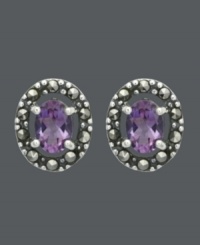 Button up your look in rich and regal hues. Genevieve & Grace stud earrings feature beautiful, oval-cut amethyst gemstones (1-1/3 ct. t.w.) encircled by glittering marcasite. Crafted in sterling silver. Approximate diameter: 1/2 inch. Button up your look in rich and regal hues. Genevieve & Grace stud earrings feature beautiful, oval-cut amethyst gemstones (1-1/3 ct. t.w.) encircled by glittering marcasite. Crafted in sterling silver. Approximate diameter: 1/2 inch.