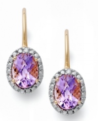 Sparkling perfection. Victoria Townsend's unique leverback earrings feature oval-cut amethyst (2-1/2 ct. t.w.) and sparkling diamond accents. Set in 18k gold over sterling silver. Approximate drop: 3/4 inch. Sparkling perfection. Victoria Townsend's unique leverback earrings feature oval-cut amethyst (2-1/2 ct. t.w.) and sparkling diamond accents. Set in 18k gold over sterling silver. Approximate drop: 3/4 inch.