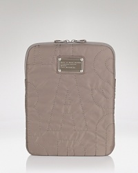 Outfit your tablet in MARC BY MARC JACOBS' signature quirky-cute style. Slip this logo-decked case inside your purse to be plugged in and pretty. Outfit your tablet in MARC BY MARC JACOBS' signature quirky-cute style. Slip this logo-decked case inside your purse to be plugged in and pretty.