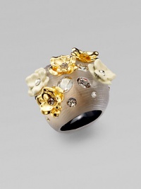 From the Lucite Collection. Dazzling Swarovski crystals, goldtone and powder-coated flowers embellish this hand-crafted lucite design. Hand-crafted luciteSwarovski crystalsGoldtone and powder-coatedWidth, about 1Made in USA