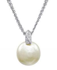 Singularly spectacular. One white man-made pearl (18 mm) stuns in this three-chain necklace by Majorica. Sterling silver setting shines with sweeping cubic zirconia accents. Approximate length: 18 inches. Approximate drop: 3/4 inch. Singularly spectacular. One white man-made pearl (18 mm) stuns in this three-chain necklace by Majorica. Sterling silver setting shines with sweeping cubic zirconia accents. Approximate length: 18 inches. Approximate drop: 3/4 inch.