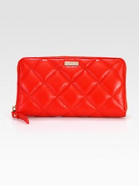 A quilted leather design with a secure zip-around closure to stay organized in style. Zip-around closureOne inside zip pocketTwo bill compartmentsTwelve credit card slotsFully lined6¾W X 3½H X ¾DImported A quilted leather design with a secure zip-around closure to stay organized in style. Zip-around closureOne inside zip pocketTwo bill compartmentsTwelve credit card slotsFully lined6¾W X 3½H X ¾DImported