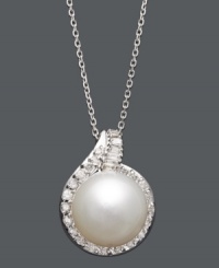 The perfect combination of polish and shine. This luxurious pendant highlights a cultured South Sea pearl (12-13 mm) surrounded by a halo of sparkling round-cut diamonds (1/2 ct. t.w.). Setting and chain crafted in 14k white gold. Approximate length: 18 inches. Approximate drop: 1 inch. The perfect combination of polish and shine. This luxurious pendant highlights a cultured South Sea pearl (12-13 mm) surrounded by a halo of sparkling round-cut diamonds (1/2 ct. t.w.). Setting and chain crafted in 14k white gold. Approximate length: 18 inches. Approximate drop: 1 inch.